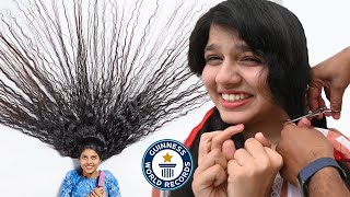 Cutting The Worlds LONGEST HAIR  Guinness World Records [upl. by Nylhsa771]