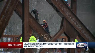 Climate demonstrators arrested on railroad bridge in Hooksett [upl. by Auhsuoj950]