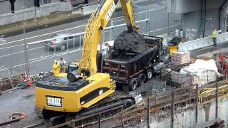 CAT 385C excavator loading a dump truck HD [upl. by Noseyt]