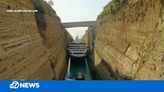 Cruise ship makes tight squeeze through canal [upl. by Roye]