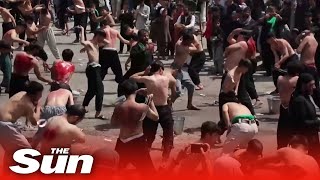 Shiite Muslims in Kabul cut themselves with swords at Shia festival after Taliban takes control [upl. by Sidonia]