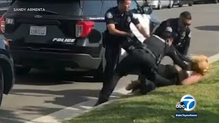 OC officer on leave after video shows him punch woman during arrest  ABC7 [upl. by Marola]